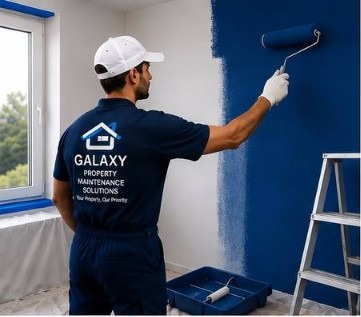Galaxy painter rolling a feature wall