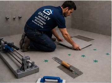 Galaxy tiler setting out floor tiles