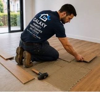 Galaxy tradesman laying timber flooring